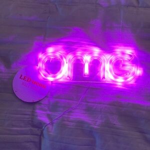 OMG pink fluorescent LED neon light. Hot pink.